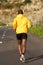 Full body behind of african american sport man running on street