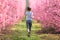 Full body of a jogger running in a field