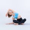 Full body length gaiety shot athletic and sporty woman doing yoga