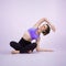 Full body length gaiety shot athletic and sporty woman doing yoga