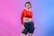 Full body length gaiety shot athletic sporty woman in fitness exercise posture