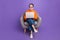 Full body length photo of sitting comfortable chair senior manager programmer businesswoman elderly isolated on purple