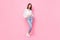 Full body photo of attractive young girl try on new jeans defile shopping sale dressed stylish white look isolated on