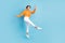 Full body photo of attractive young woman jump dance enjoy lightness elegant dressed stylish orange look isolated on