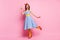 Full body photo of beautiful funny lady showing v-sign symbol stand on one leg wear headband dotted dress long skirt red