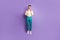 Full body photo of charming handsome man fix adjust pink bow tie jump air isolate on violet color background