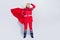 Full body photo of cheerful happy old woman work paramedic look empty space wear cloak hero isolated on grey color