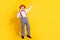 Full body photo of cool aged man dance wear red cap tie shirt suspenders trouseres boots isolated on yellow background