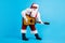 Full body photo of crazy funky pop star santa claus with big beard stomach play guitar instrument on x-mas christmas