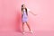 Full body photo of crazy kid girl listen wireless headset music sing wear purple overall isolated over pastel color