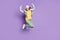 Full body photo of funky pretty lady stylish clothes jump high rejoicing champion screaming good mood wear casual hat