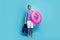 Full body photo of funny excited guy tourist swimmer hold underwater mask breathing tube flippers pink lifebuoy wear