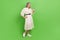 Full body photo of lovely retired lady hold telephone share user comment eshop wear trendy white outfit  on