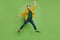 Full body photo of mature joyful active happy man jump up good mood isolated on green color background