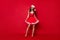 Full body photo of pretty lady came to theme party wear fluffy snow dress isolated red background
