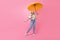 Full body photo of satisfied young girlfriend blonde wavy hair enjoy her new big parasol stylish outfit isolated on pink