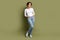 Full body photo of skinny attractive model lady advertising new clothes sale shopping isolated khaki green color