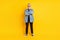 Full body photo of strict grandpa crossed arms wear eyewear jacket pants isolated on yellow background