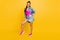 Full body photo of young afro girl happy positive smile fancy cool hipster isolated over yellow color background