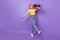 Full body photo of young girl happy positive smile go walk boombox party sound isolated over violet color background