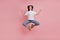 Full body photo of young girl meditate om zen asana balance jumper isolated over pink color background