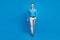 Full body photo of young man happy positive smile confident go walk step isolated over blue color background