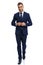 full body picture of unshaved young man adjusting navy blue suit