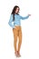 Full body picture of a young casual woman presenting