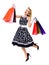 Full body portrait of jumping or levitating woman in pinup style with shopping bags