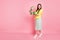 Full body profile photo of funny lady hold hands large green giftbox opening it overjoyed amazing surprise wear yellow