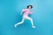 Full body profile side photo of lady jump run fast empty space isolated over blue pastel color background