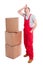 Full body of tired mover guy standing near boxes