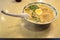 Full bowl of japanese chashu ramen with half boiled egg, wagame, bamboo shoot and spring onion in rich yuzu pork broth