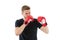 Full concentration. Sportsman concentrated training boxing gloves. Athlete concentrated face with sport gloves practice