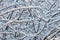 full frame background of frozen branches pattern at daylight