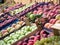 Full frame background of various fruits at a market stall. Focus in the middle