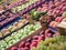 Full frame background of various fruits at a market stall. Focus in the middle