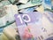 Full frame of Canadian dollar bill, focus on ten