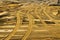 Full frame close up of countless wildly scattered wheel tracks in sand of construction site - Germany