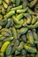Full frame close-up of fresh green pickles, gherkins