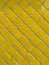 Full frame detail of yellow tiled wall