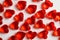 Full Frame Image of Sparkling Red Gemstone Hearts on a White Studio Background