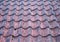 Full frame image of traditional old terracotta curved overlapping pantile roof tiles