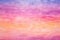 full frame of layered watercolor in a gradient of sunset hues