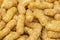 Full frame shot of crunchy peanut puffs. Food background