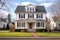 full-frontal shot of colonial revival house with gambrel roof