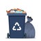 Full garbage bin and black plastic trash bag around. Overflowing recycling container with trash. Black recycle can. Street dump