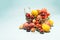 A full grocery basket with fresh fruits bananas, cherries, nectarines, apricots, peaches on a blue background