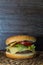 Full hamburguer on rustic background