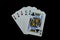 Full house aces full of kings of cards in poker game against black background